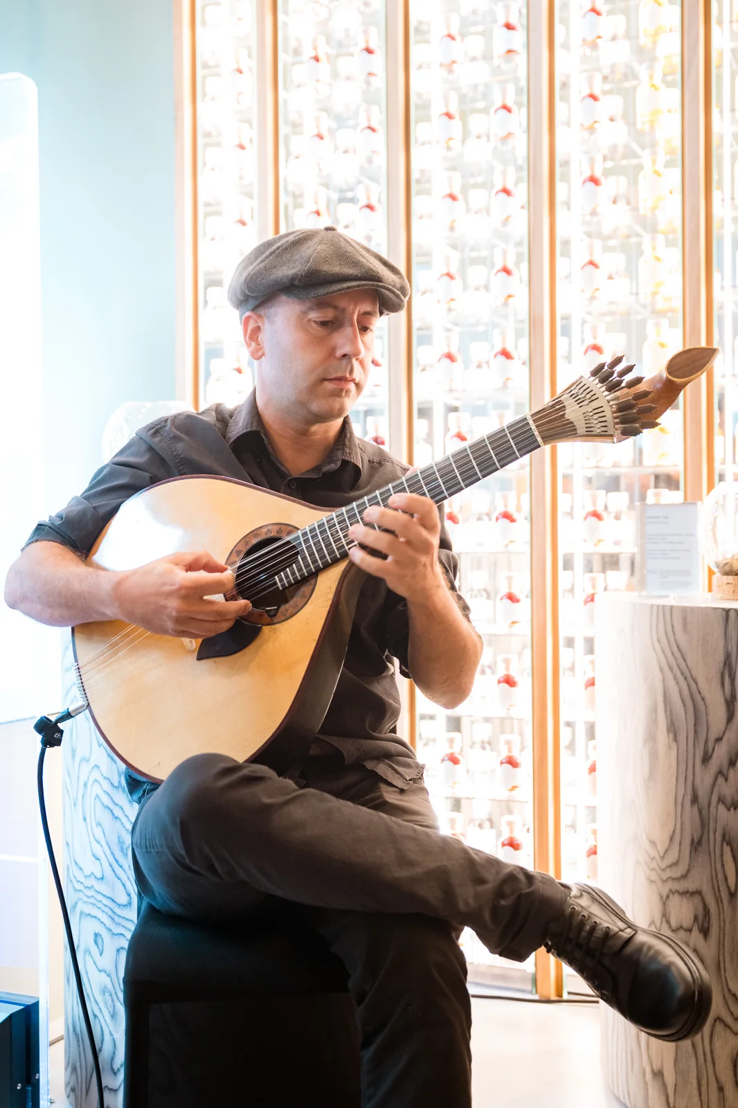 Portuguese guitar performance during a store event
