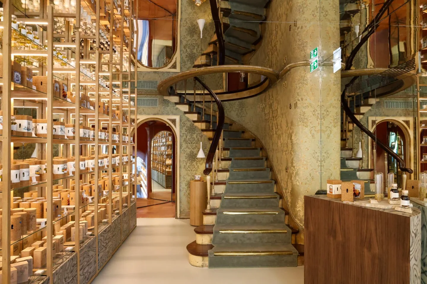 Our century-old staircase, framed by Portuguese gifts and mirrors